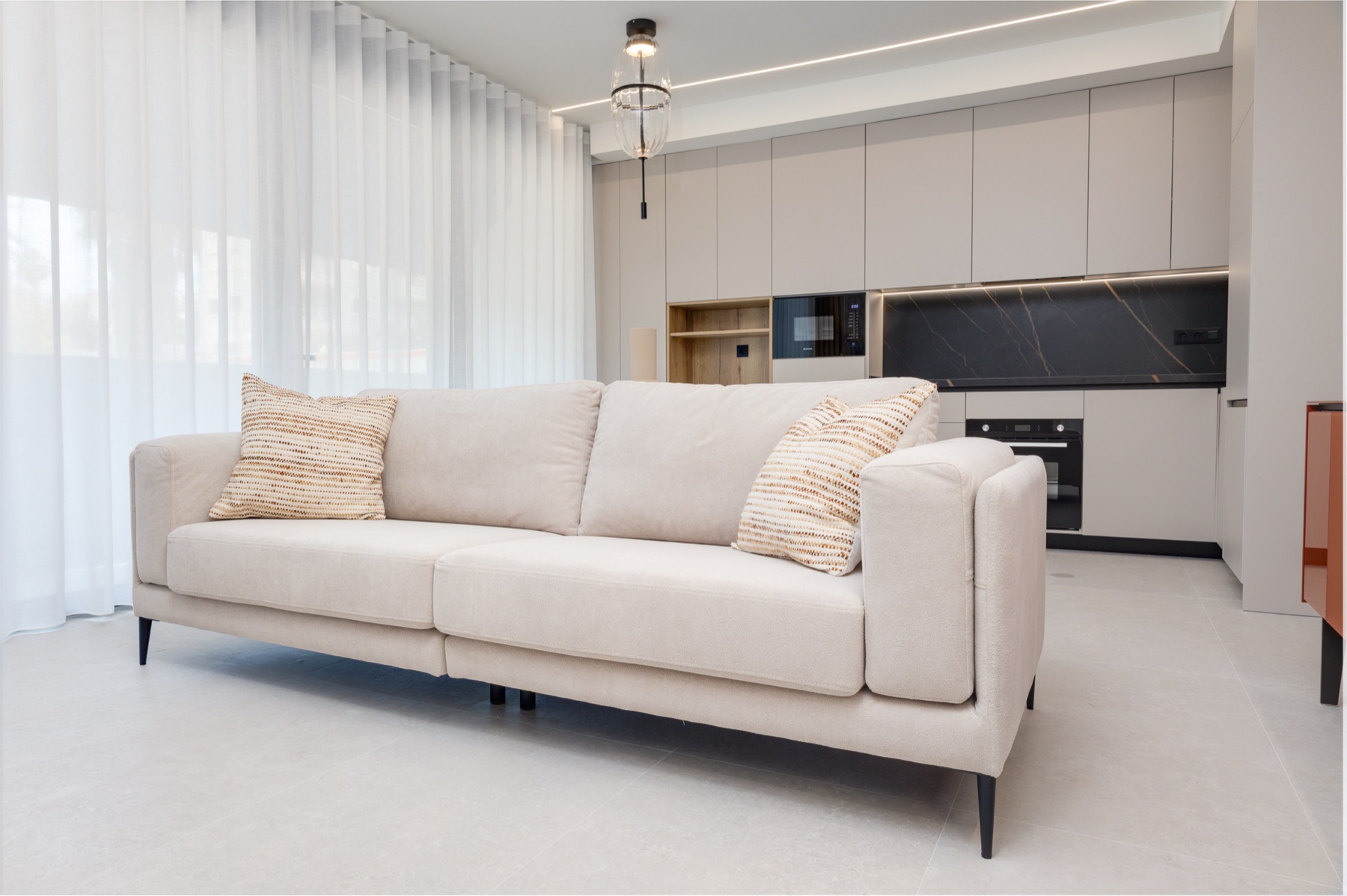 Dunara Towers living area and kitchen impression